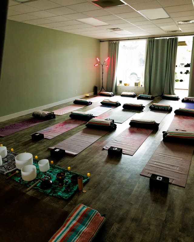 Soul Deep Yoga studio room prepared with mats and practice props.